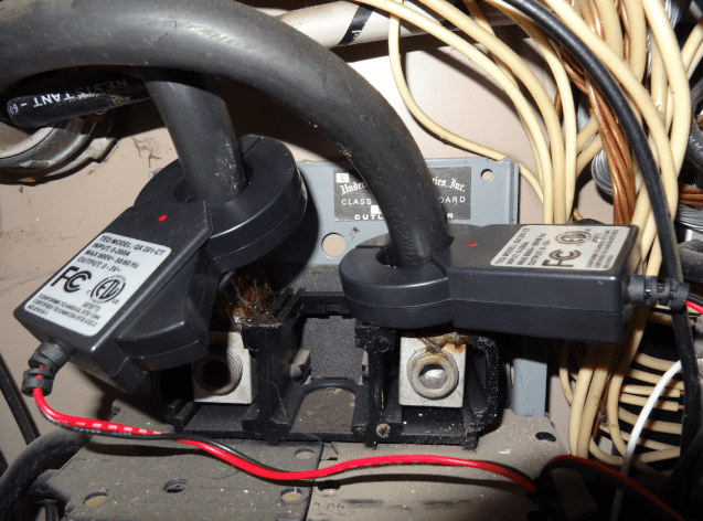 These are the two TED5000 current meters clamped at the top of the mains